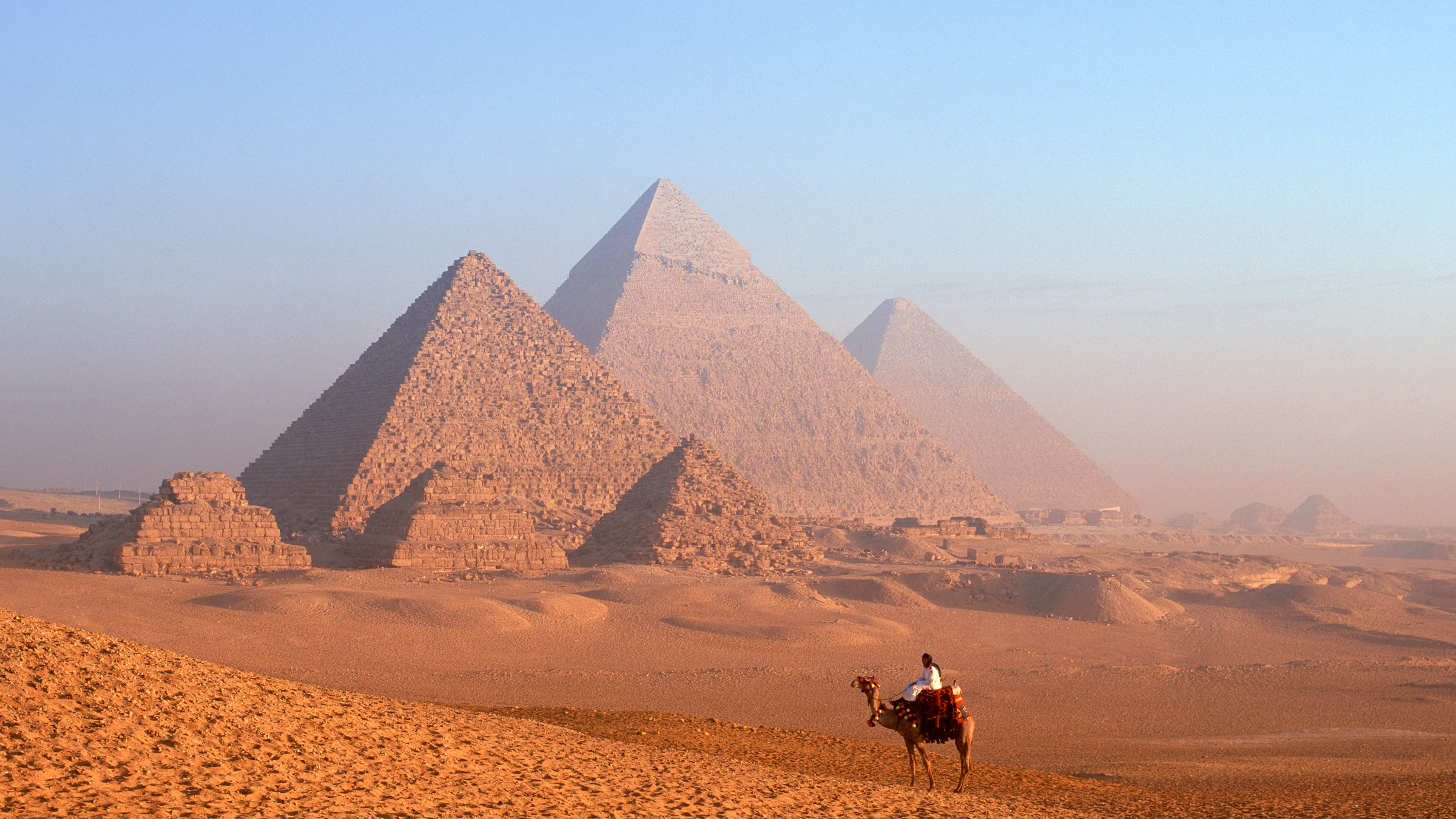 Aerial photograph of the pyramids of Giza with surrounding plateau